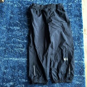 REI rain pants.
